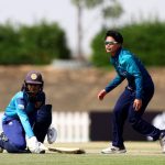 ABU DHABI, UNITED ARAB EMIRATES - APRIL 25: Nattaya Boochatham of Thailand looks on as Vishmi Gunaratne of Sri Lanka makes ground during the ICC Women's T20 World Cup Qualifier 2024 match between Sri Lanka and Thailand at Tolerance Oval on April 25, 2024 in Abu Dhabi, United Arab Emirates. (Photo by Francois Nel-ICC/ICC via Getty Images) (Photo by Francois Nel-ICC/ICC via Getty Images)